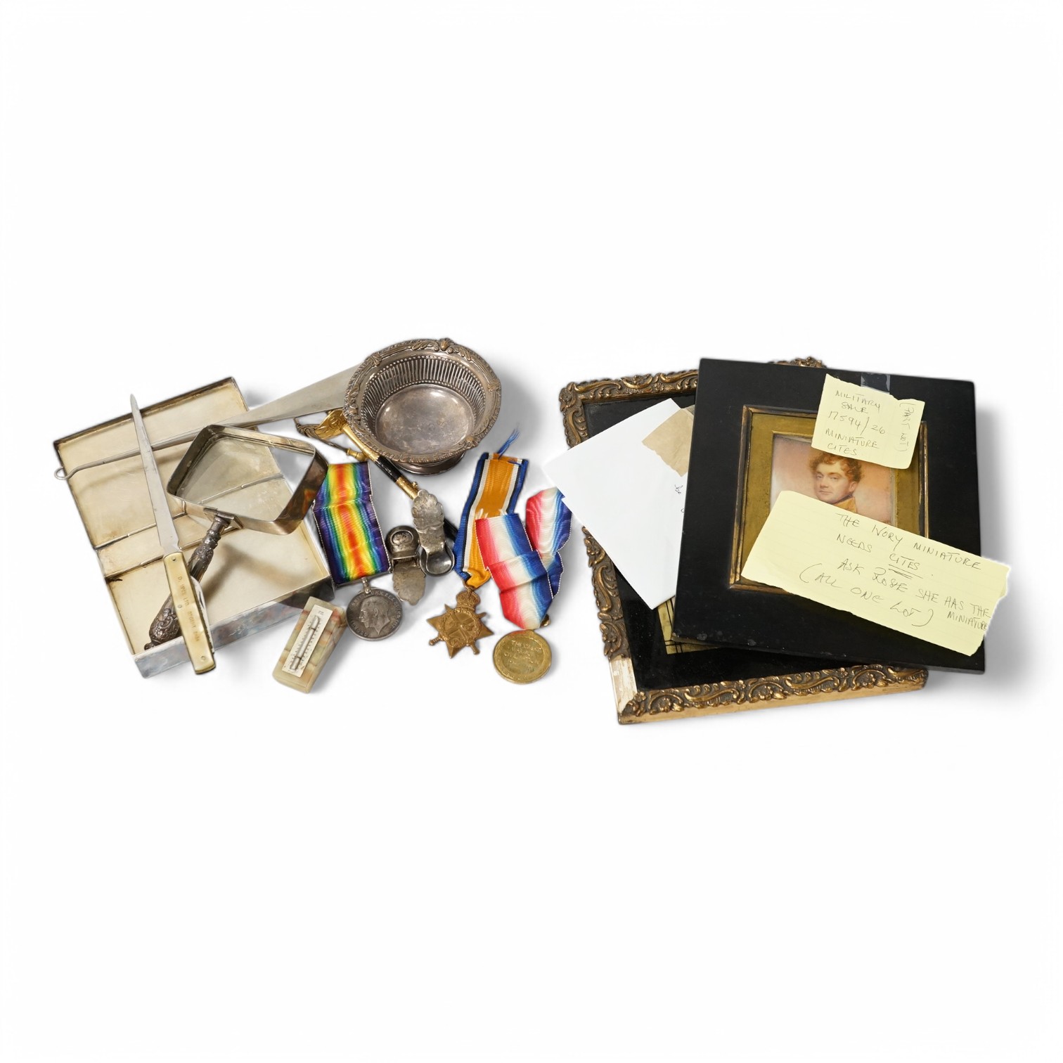 A First World War medal trio awarded to Lieut. W. Cleveland-Stevens. R.N.V.R., together with a miniature on ivory of a 19th century Captain with description to reverse, a signed military coloured engraving, a paper knife